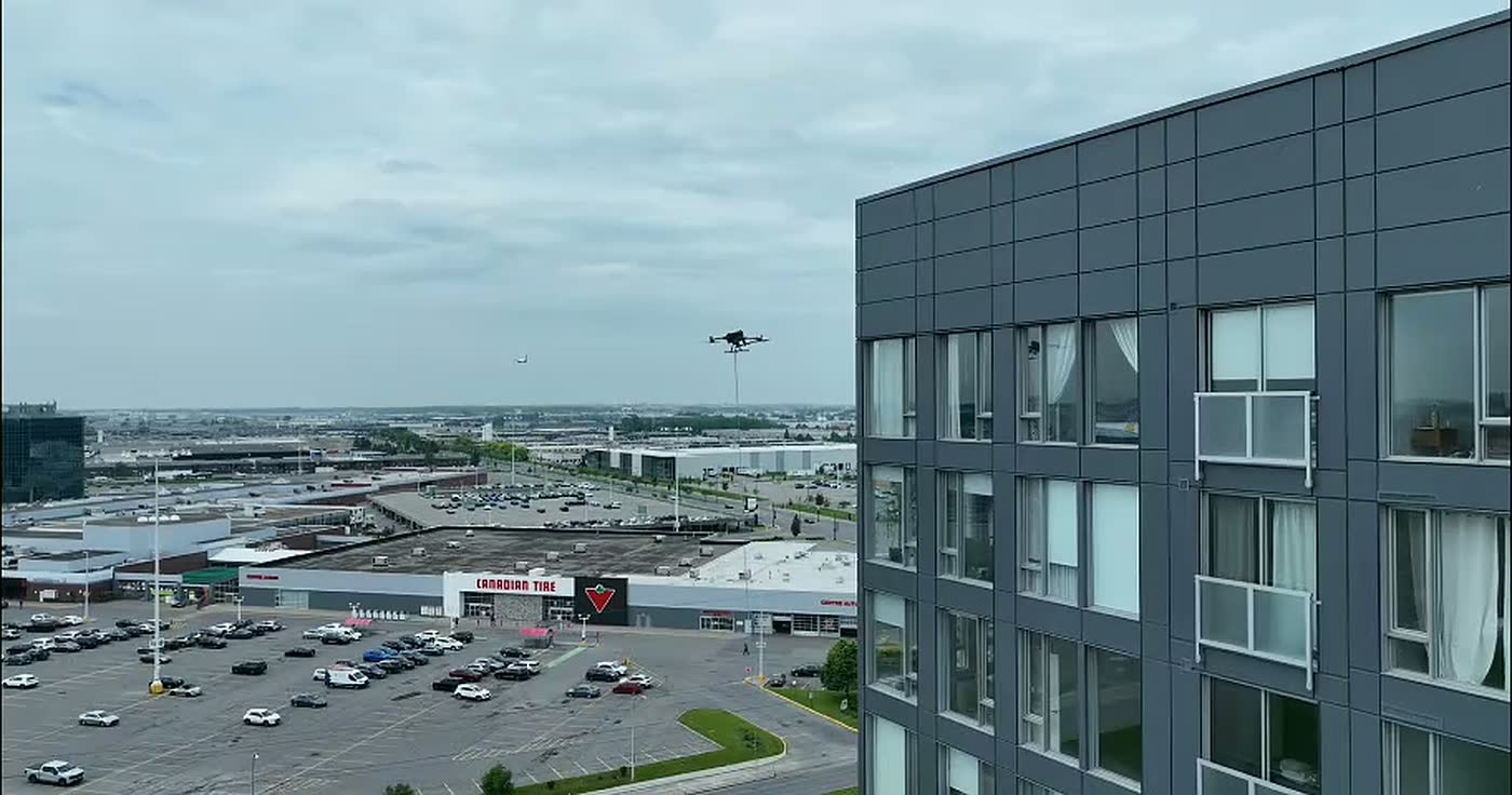 The drone moving in on the main block